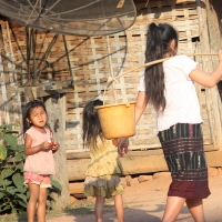 Locals carrying water